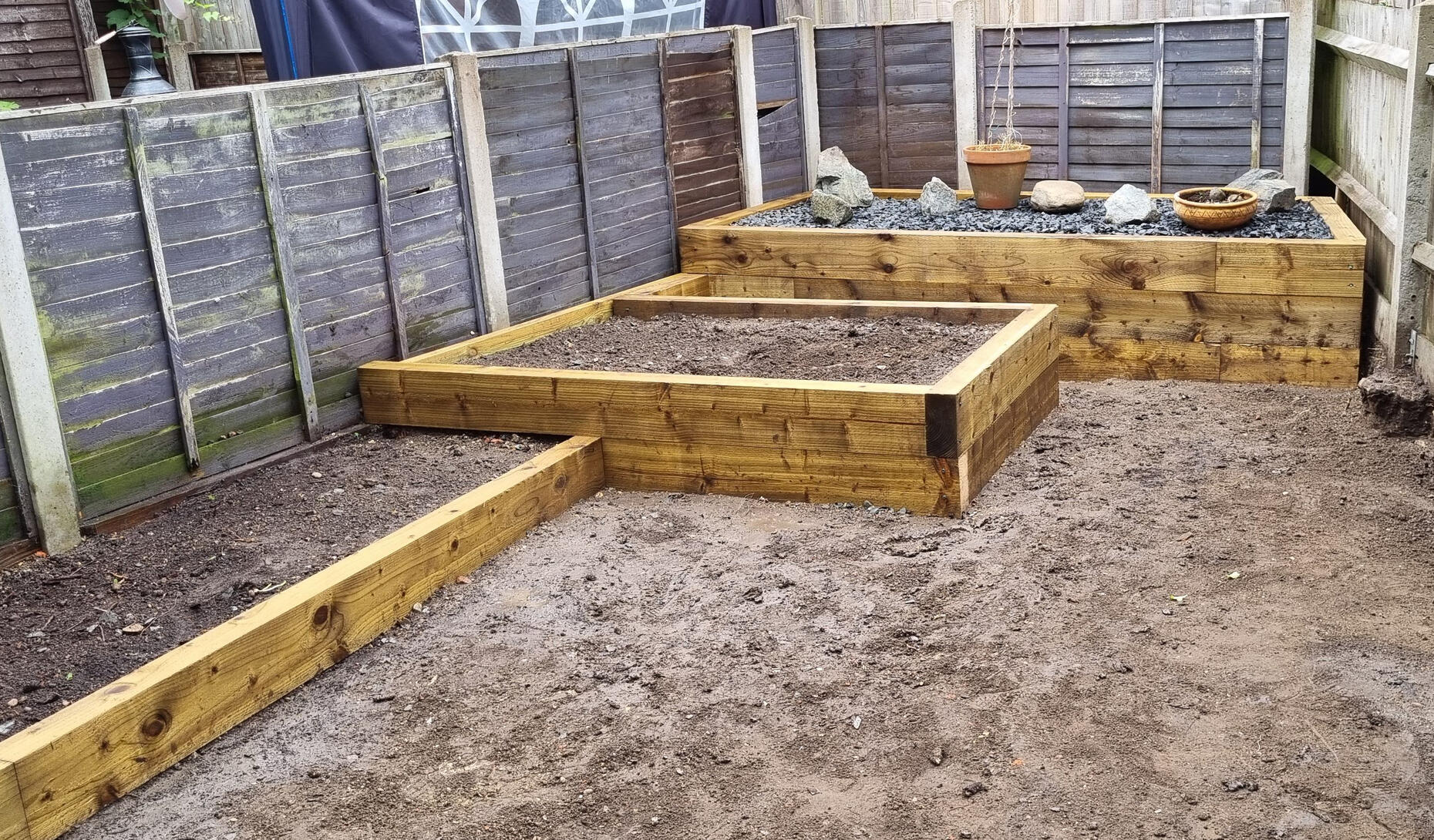 Raised Beds with Sleepers Garden landscaping project. Custom made raised beds using softwood sleepers. All work completed by MJA Garden Landscaping, Farlington, Portsmouth.